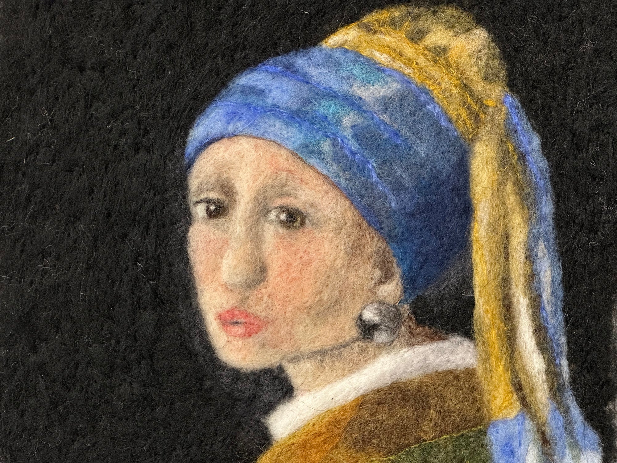 Needle felted picture, inspired by the Girl with the pearl earring