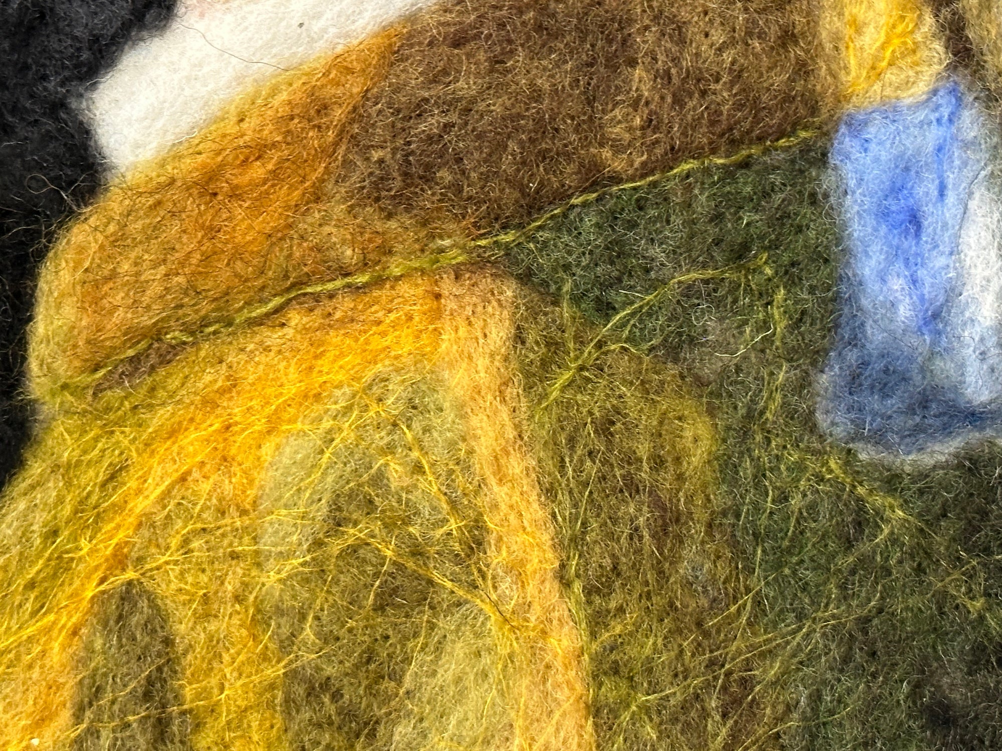 Needle felted picture, inspired by the Girl with the pearl earring